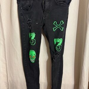 SHEIN Black Pants with Green Skull Design